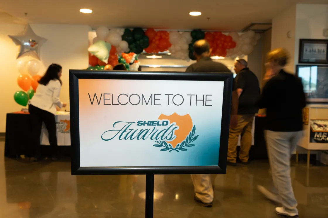 Welcome sign at the annual SHIELD Awards celebration, decorated with balloons